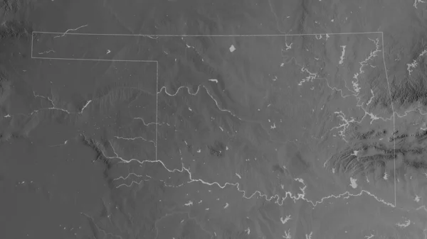 Oklahoma, state of United States. Grayscaled map with lakes and rivers. Shape outlined against its country area. 3D rendering