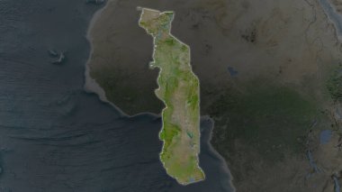 Togo alanı genişledi ve çevresinin koyu bir arka planında parladı. Uydu görüntüleri