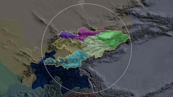 Kyrgyzstan zoomed and circled. Colored and bumped map of the administrative division. 3D rendering