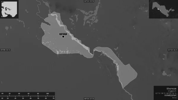 Khorezm, region of Uzbekistan. Grayscaled map with lakes and rivers. Shape presented against its country area with informative overlays. 3D rendering