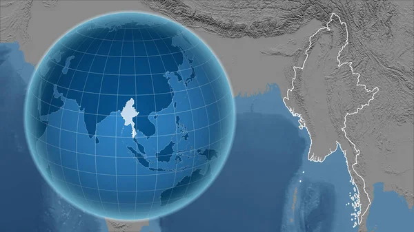 Myanmar. Globe with the shape of the country against zoomed map with its outline. grayscale elevation map