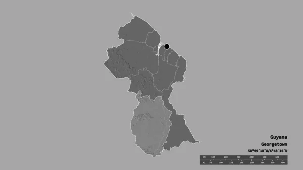 Desaturated shape of Guyana with its capital, main regional division and the separated Upper Takutu-Upper Essequibo area. Labels. Bilevel elevation map. 3D rendering