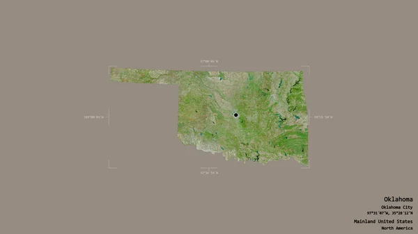Area of Oklahoma, state of Mainland United States, isolated on a solid background in a georeferenced bounding box. Labels. Satellite imagery. 3D rendering