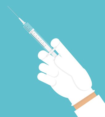 Hand holding hypodermic needle