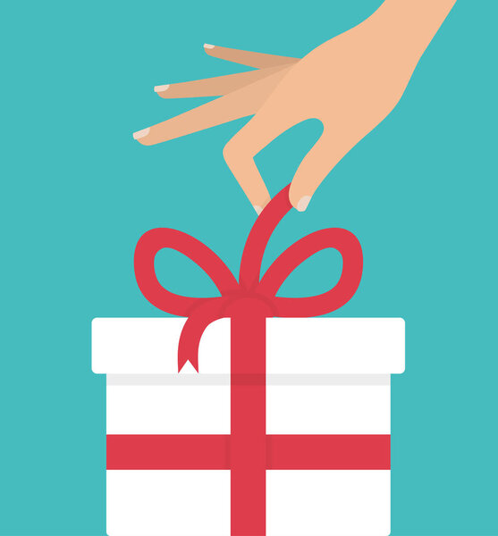 Женская рука распаковывает белый подарочный коробок с красным бантом
