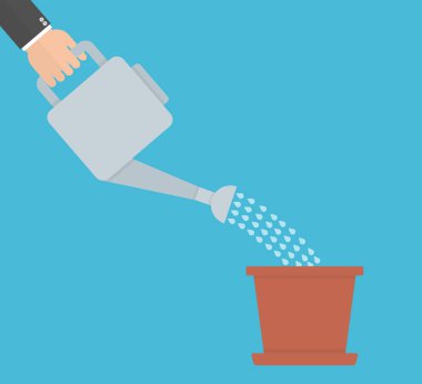 işadamı sulama saksıyı sulama olabilir üzerinde mavi arka plan ile görüntü kırpılmış