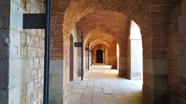 Gallery with arches in a brick structure. — Stock Video