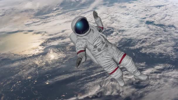 Trifft der Astronaut den Planeten Erde. Elemente dieses Videos von nasa. 3D-Darstellung — Stockvideo