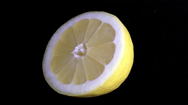 Cut Yellow Lemon Macro Close View Black Background — Stock Video