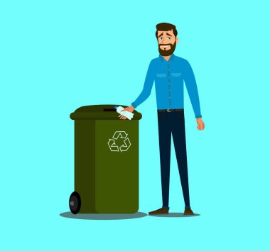 The concept of caring for the environment and sorting garbage. Young man throws a plastic bottle into the trash can. .