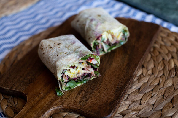 Vegetarian Wraps with beetroot, red cabbage, arugula and humus 