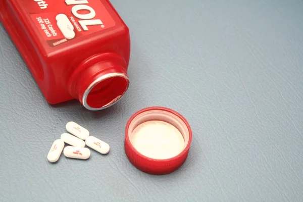 wa usa, 09 23 2025: Tylenol Extra Strength 500mg caplets for adults in a red bottle, pain relief and fever reducer.