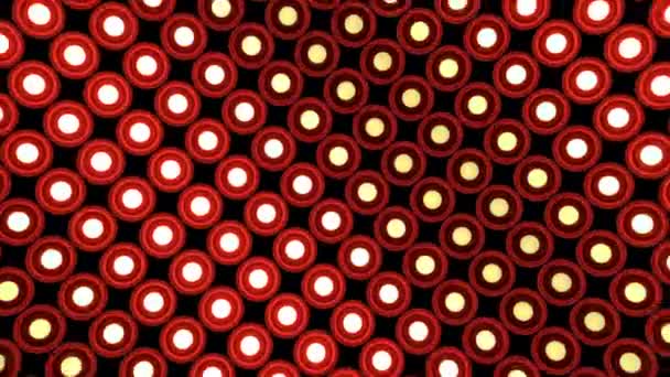 Luces parpadeante pared redonda bombillas patrón rotación etapa fondo rojo vj bucle — Vídeos de Stock