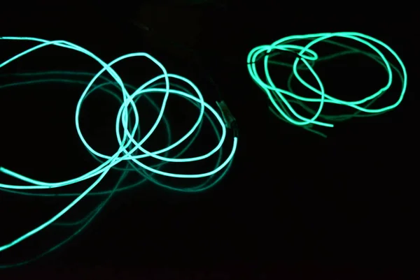 Chaotische Gloeiende Achtergrond Van Draden Lijnen Gedraaide Texturen Electroluminescente Draad — Stockfoto