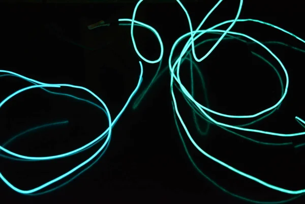 Chaotische Gloeiende Achtergrond Van Draden Lijnen Gedraaide Texturen Electroluminescente Draad — Stockfoto