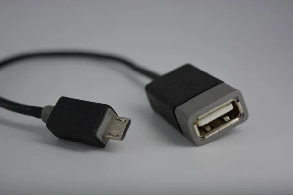 Black electrical cable and electronic cable USB cable to Micro USB charging.