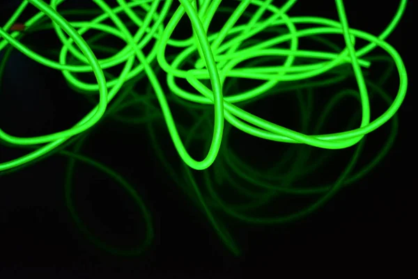 Farklı Şekil Yapılara Sahip Toksik Yeşil Işıklı Elektrolüminesans Telleri Siyah — Stok fotoğraf