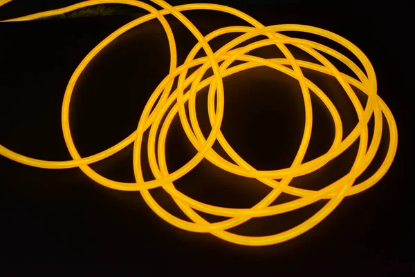 Helder Oranje Lichtgevende Draad Gedraaide Licht Draad Kabel Verschillende Vormen — Stockfoto