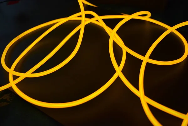 Bright Orange Luminous Wire Twisted Light Wire Cable Different Shapes — Stock Photo, Image