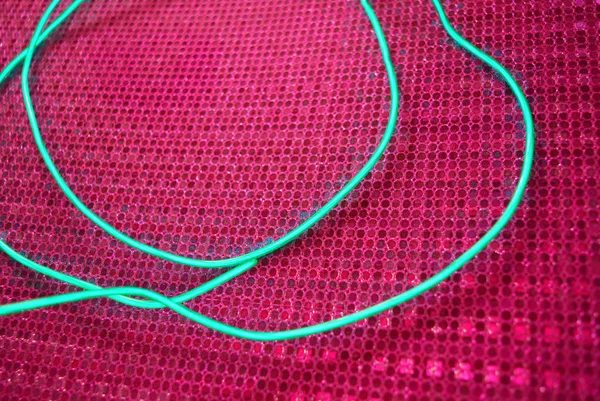 Grön Glödande Tråd Kall Neon Elektroluminiscent Sladd Kabel Ligger Holografisk — Stockfoto