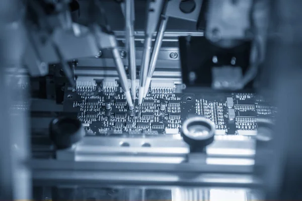 The automatic electronics circuit board assembly line .