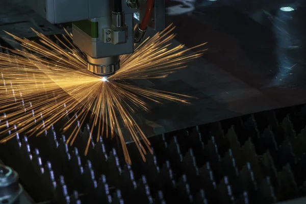 The fiber laser cutting machine control by CNC program.