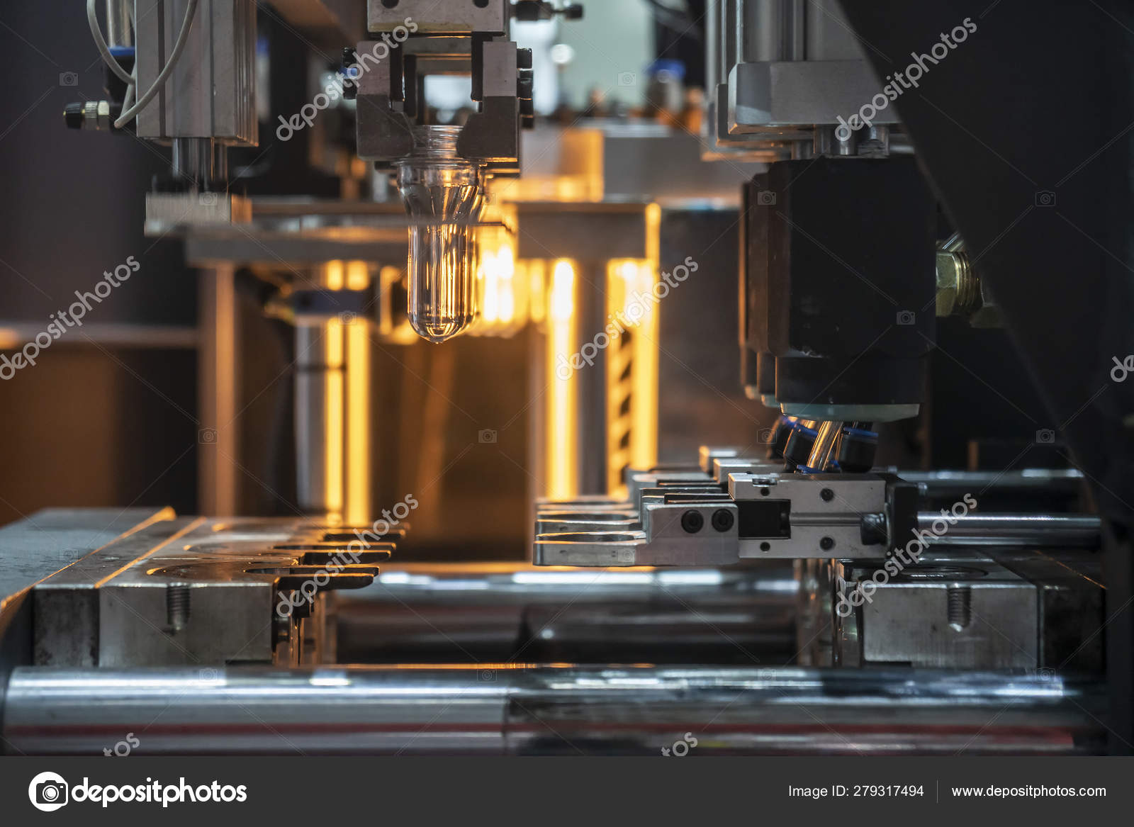 The Plastic Bottle Blowing Machine With The Preform Shape Stock Photo Image By C Phuchit A Gmail Com