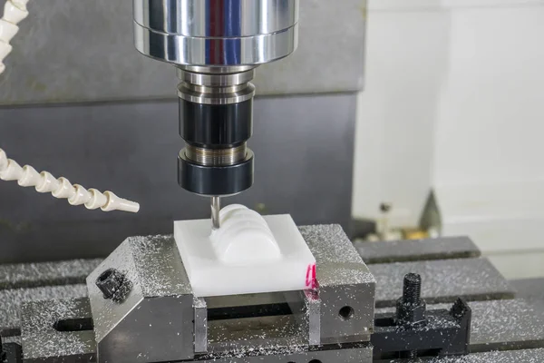 The CNC milling machine hi-precision cutting the plastic parts . — Stock Photo, Image