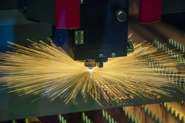 The fiber laser cutting machine make hole on the sheet metal .
