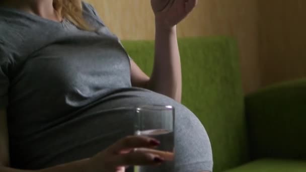 Pregnant Caucasian Girl Eat Pills — Stock Video