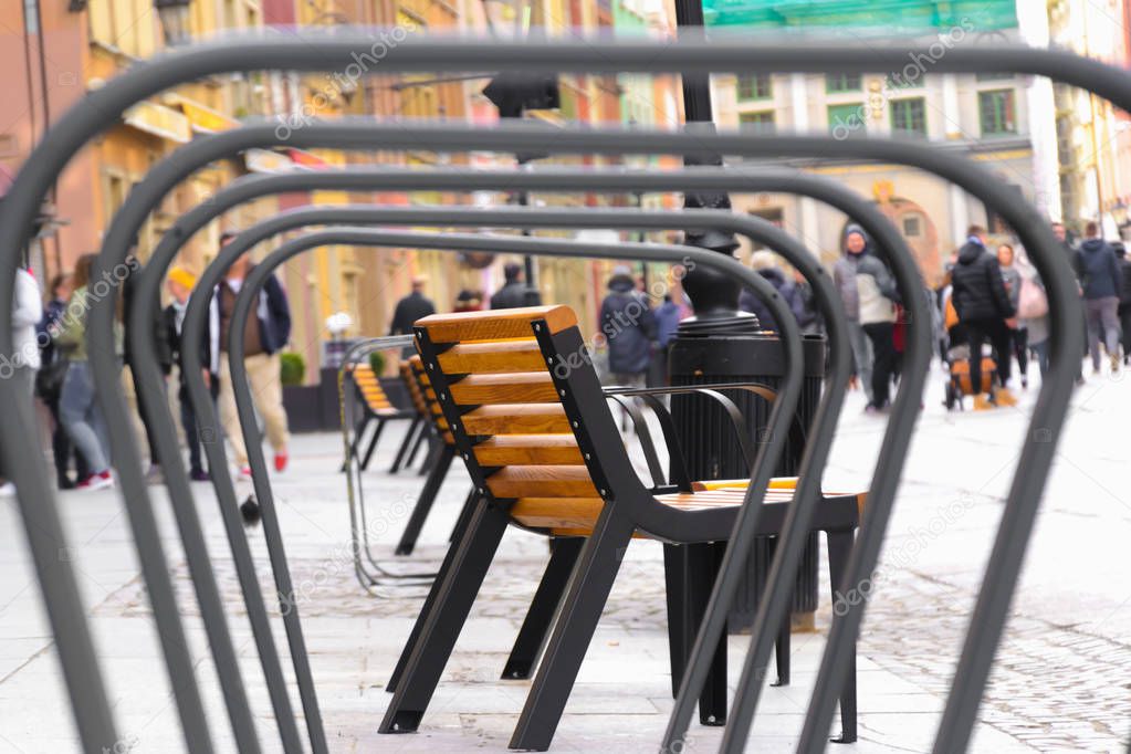 View of bench in european center of Gdansk, poland, View throgh bicycle parking