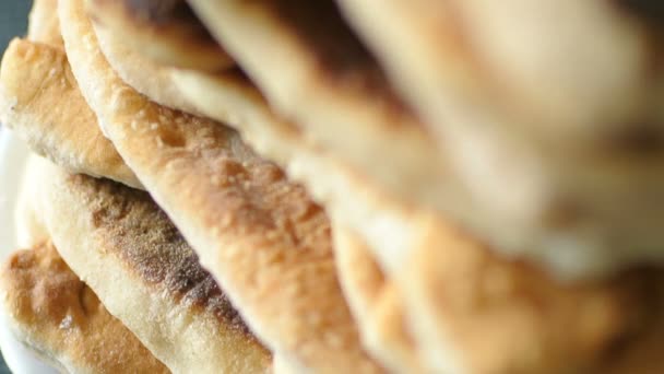 Roasted pies in column close up panning macro fresh tasty — Stock Video