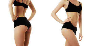 Güzel ince kadın bedeni. Temiz sağlıklı cilt, düz bir karın ile şehvetli kadın şekli. Spa güzellik vücut parçası. Beyaz arka plan üzerinde izole mükemmel kadın bedeni. Ayarla