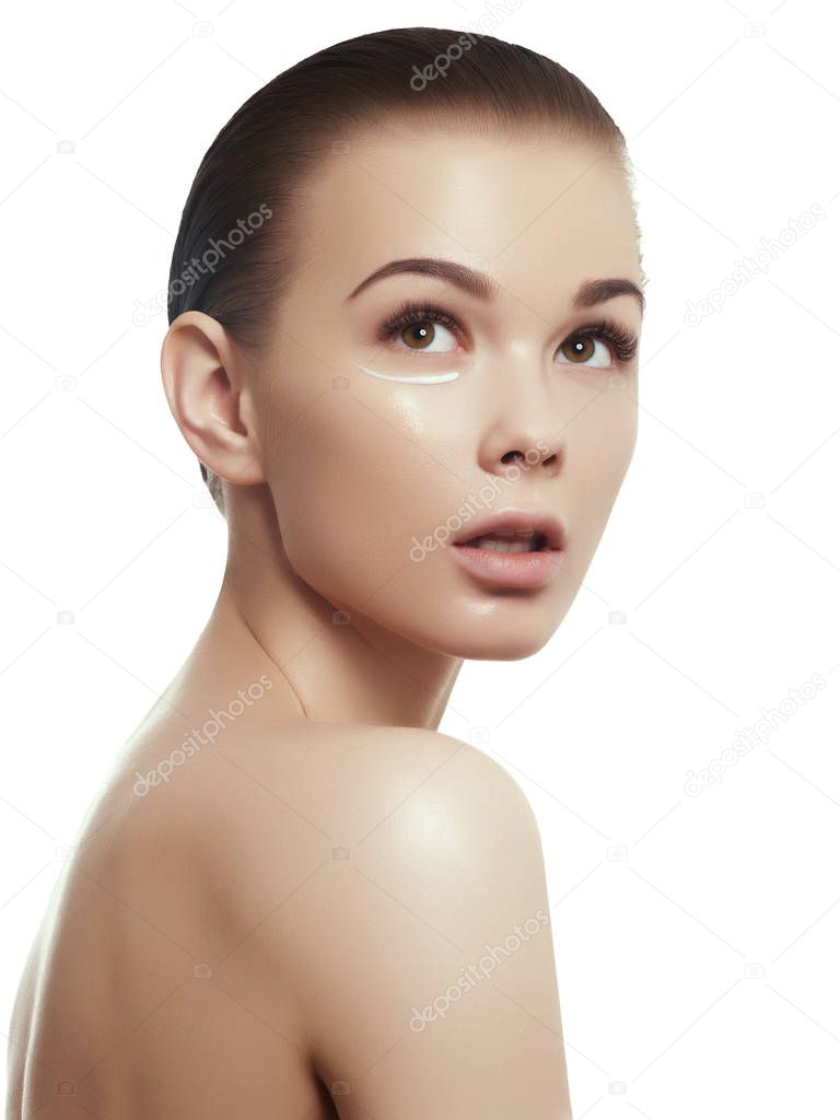 Beauty woman face portrait. Beautiful spa model girl with perfect fresh clean skin. Brunette female smiling. Youth and skin care concept. Over white background