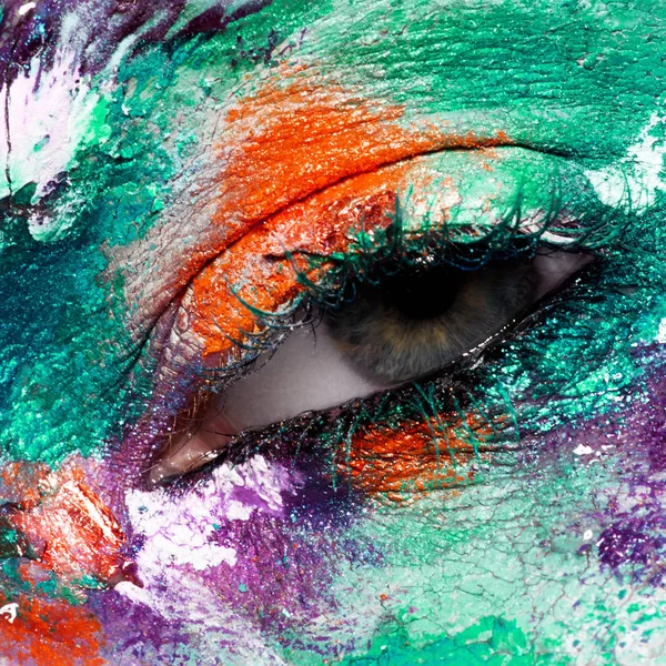 Beauty, cosmetics and makeup. Magic eyes look with bright creative make-up. Macro shot of beautiful woman's face with perfect art make up. Closeup of female eye. Body art — Stock Photo, Image