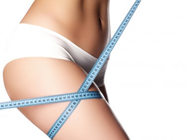 Mükemmel ince kız Genç vücut tonda. Spor, fitness veya plastik cerrahi ve estetik kozmetik. Güzellik vücut. Vücut bakımı. Temiz cilt