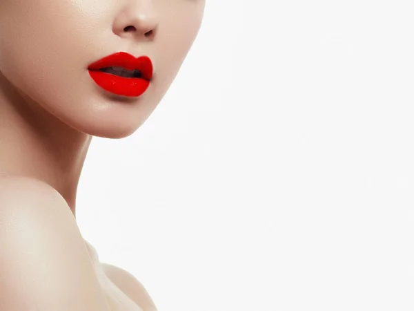 Woman health. Red Sexy Lips . Open Mouth. Makeup cosmetics. Make up concept. Beauty model girl\'s face isolated on white background. Filler injections. Lip augmentation, Beautiful Perfect Lips