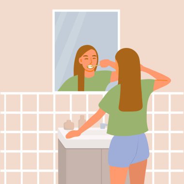 Bir kız aynanın önünde dişlerini fırçalıyor..