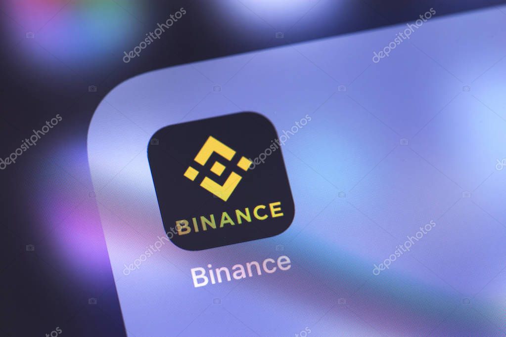 Binance icon on the screen smartphone. Binance - cryptocurrency exchange. Moscow, Russia - October 14, 2018