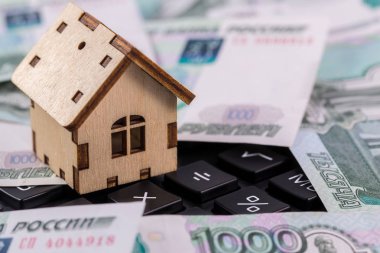 symbol house and russian rubles on the calculator clipart