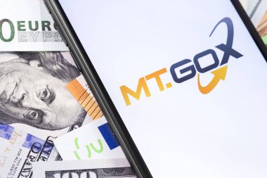 para ve mt.Gox logosu ekran akıllı telefon üzerinde döviz. Mt.G
