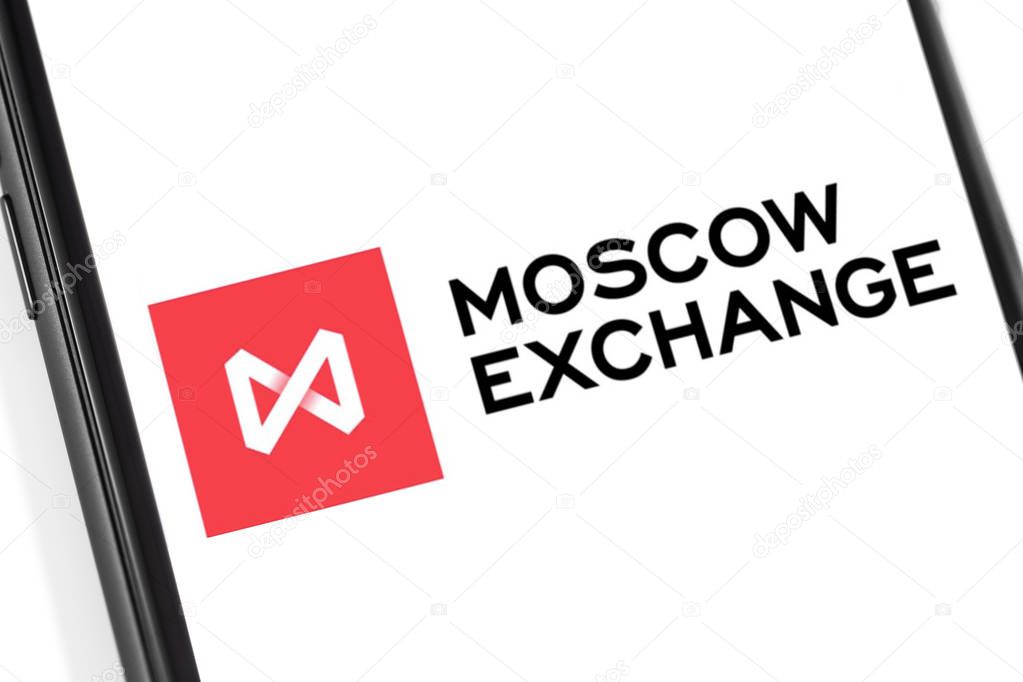 Closeup smartphone with Moscow Exchange logo. Moscow, Russia - March 17, 2019