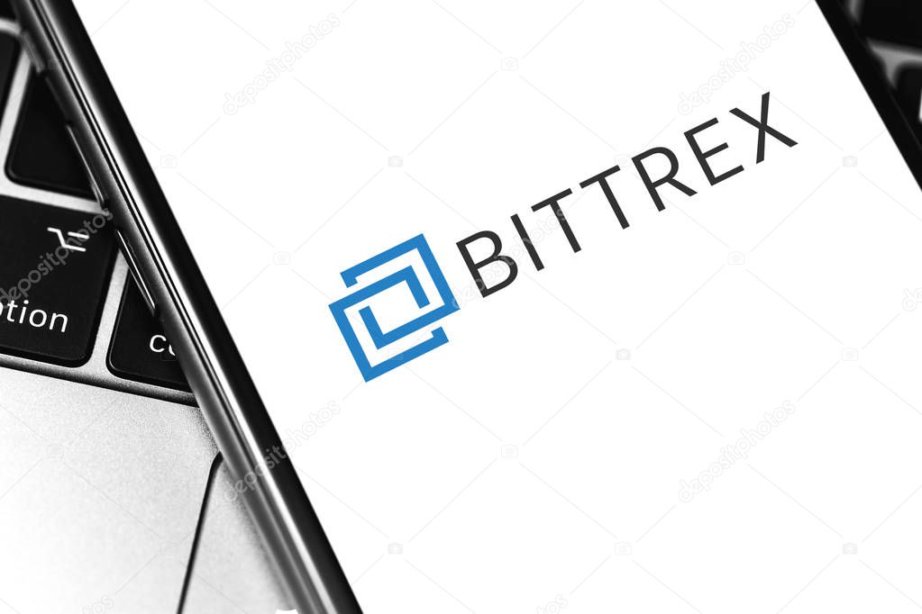 Closeup Bittrex cryptocurrency exchange logo on the screen smartphone. Moscow, Russia - March 26, 2019
