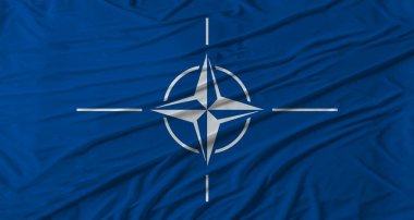 NATO bayrağı sallanıyor. Kumaş desenli NATO bayrağı