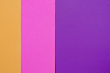 Mor, pembe ve turuncu nun üst üste binen renkli kağıt arka plan