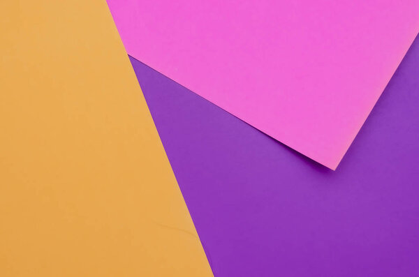Color paper background overlapping of purple, pink and orange