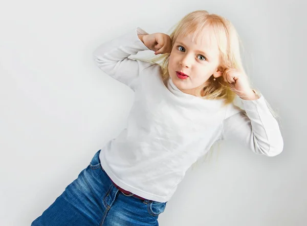 Little Girl Teasing Showing Tongue Doing Face White Background Soft — Stock Photo, Image