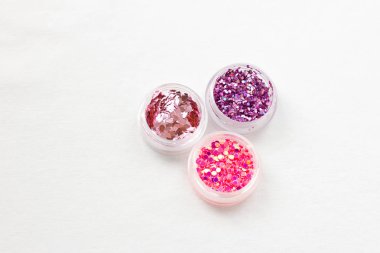 Glitter ve payetler tırnak tasarım ve makyaj için. süslemeleri için moda ve güzellik