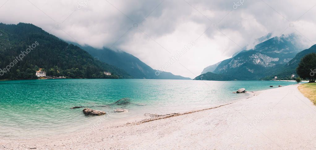 Panoramic view to the Lake Molveno in Trentino on a cloudy day in summer.