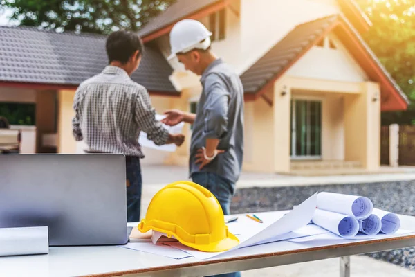 Two business man professional engineer worker at the house build — Stock Photo, Image